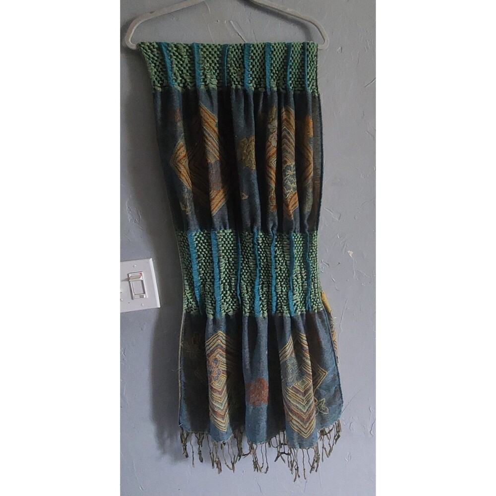 Bufanda scarf or foulard, made with textile panels and elastic details.